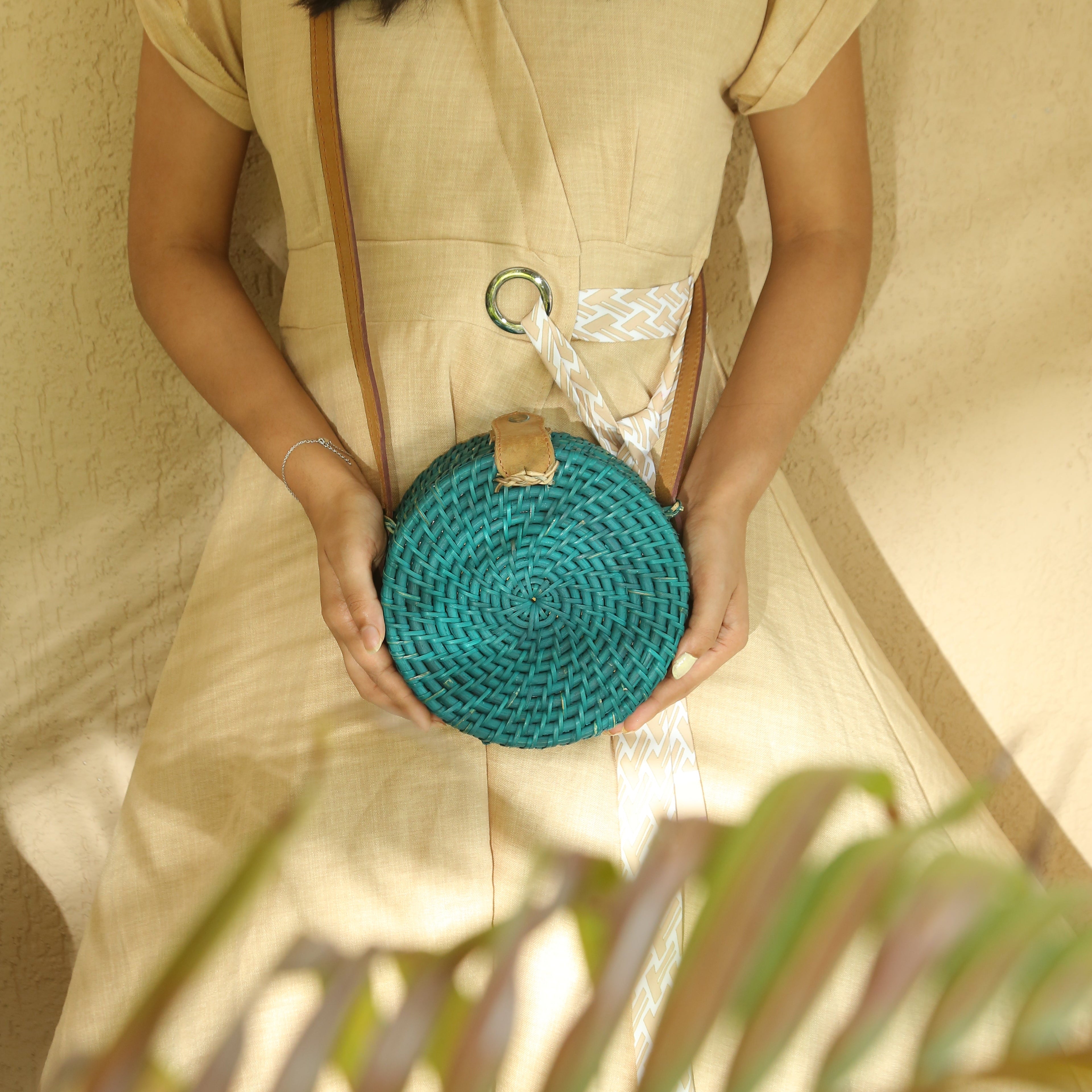 TURQUOISE CANE SLING BAG