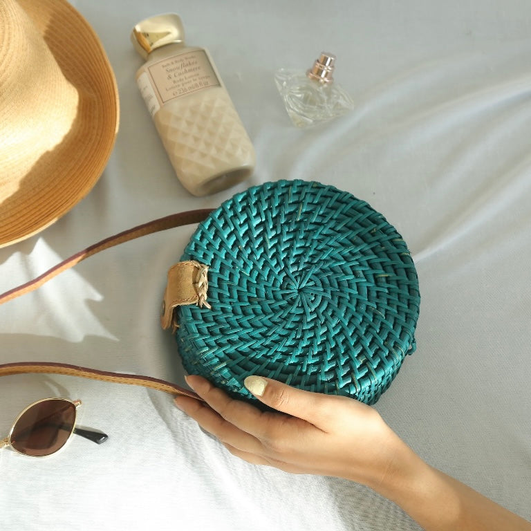 TURQUOISE CANE SLING BAG