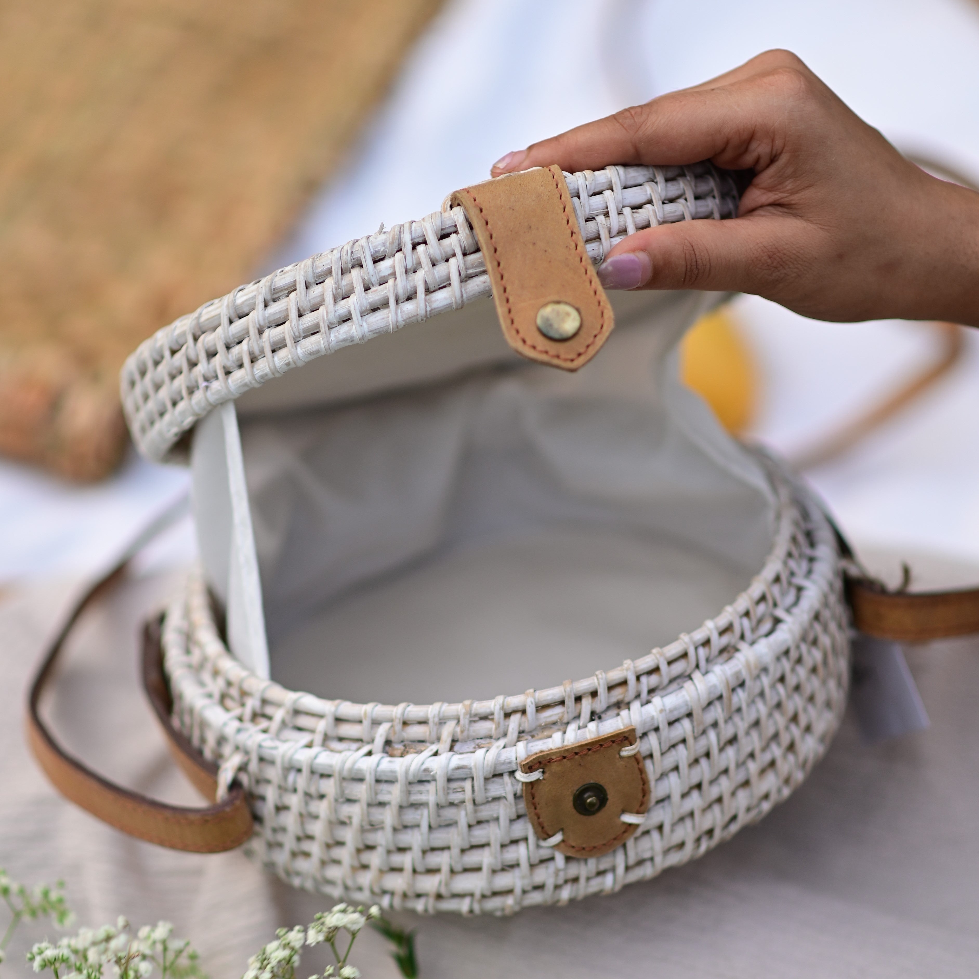 IVORY CANE SLING BAG