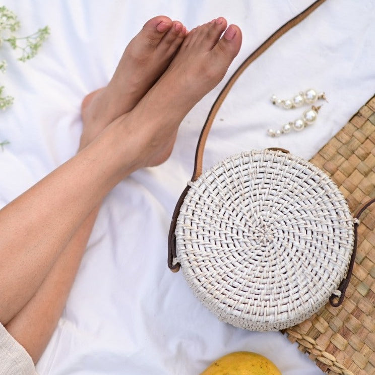 IVORY CANE SLING BAG