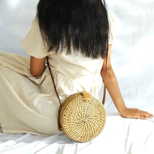 NATURAL CANE SLING BAG